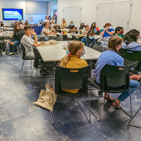 Students listening to presentation