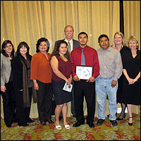 Juan Talamantes with family, mentor, and staff