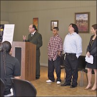 Students standing at press conference