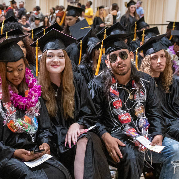 Students wearing caps and gowns