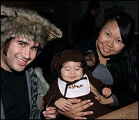 Parents with infant dressed in costume