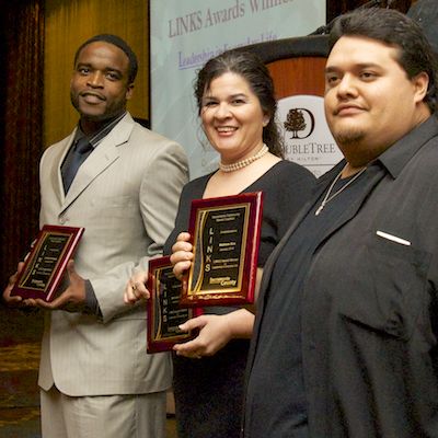 Clients holding plaques