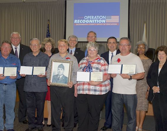 Operation Recognition graduates posing with Board members