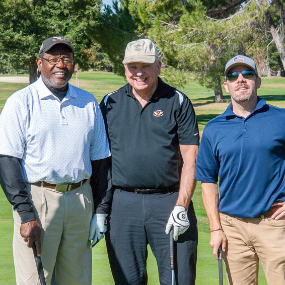 Group of golf players posing