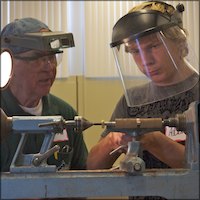 Student using lathe