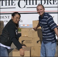 Staff hauling boxes