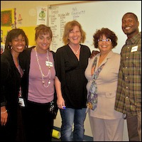 Group posing in classroom