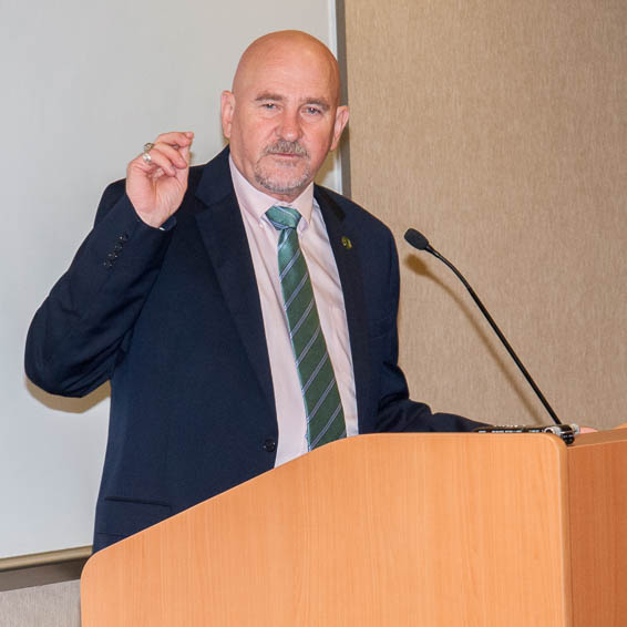 Robert S. Nelsen speaking at podium