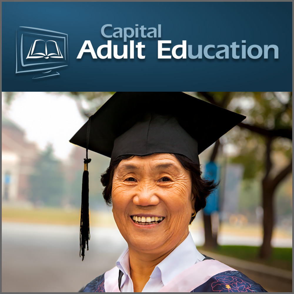 A female student wearing a graduation cap and grown 