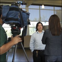 Student being interviewed after at press conference